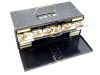 A black japanned rectangular salmon fly reservoir, fall front door opening to reveal seven drawers each with twin ivorine index tabs and brass loop handle , fitted nickel silver spring clips and holding a good selection of 287 fully dressed eyed flies of