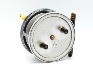 A scarce Hardy Super Silex 3 &frac34;" wide drummed bait casting reel, solid polished alloy drum (no perforations) with twin ebonite handles, spring release latch and jewelled bearing, ribbed brass foot, ivorine rim mounted casting trigger, milled tension screw