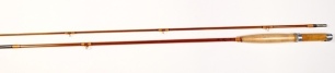 A scarce Hardy "Riccardi" 2 piece cane brook trout fly rod, 7', #6, gold/black tipped silk wraps, sliding alloy reel fitting, staggered ferrule, suction joint, 1980, very good condition and still with plastic wrapper to handle, in bag and alloy tube