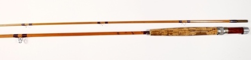 A Thomas Moran " Dry Fly" 2 piece cane trout fly rod, 9', #6/7, crimson silk wraps, wooden reel seat, alloy screw grip reel fitting, suction joint, probably Partridge made during Moran's time at the company, in bag