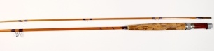 A Thomas Moran " Dry Fly" 2 piece cane trout fly rod, 9', #6/7, crimson silk wraps, wooden reel seat, alloy screw grip reel fitting, suction joint, probably Partridge made during Moran's time at the company, in bag