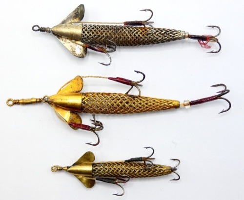 Three Allcock Wire Phantom baits, 2 &frac12;", 2 &frac12;" and 2" examples, two gilt metal one silvered finish, each with twin spinning head vanes, one vane stamped "patent", mesh wire body, rear and two side mounted flying treble hooks, circa 1900 (3)