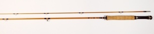 A good S. Wooley "Bentley Brook" 2 piece cane brook trout fly rod, 6'6", #3/4, crimson silk wraps, rosewood reel seat with sliding alloy fitting, agate lined stripping guide, suction joint, only very light signs of use, in original bag