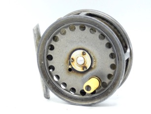 A scarce Hardy St George 3 3/8" trout fly reel, rarely seen model without factory fitted line guide, shallow cored drum with ivorine handle and three screw drum latch, alloy foot, milled rim tension screw and Mk.I check mechanism, only light wear from n