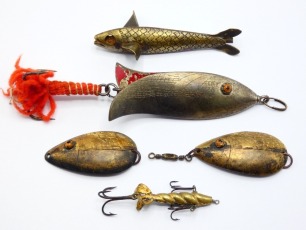 A James Ogden Patent Spinner 1 &frac12;" brass bait, open spiral fish shaped lure with rear triple spinning vanes, stamped model details, two side mounted and one rear flying treble hooks, circa 1900, an Allcock Clipper 3" white metal bait, twin glass eyes, inci