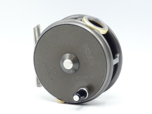 A Hardy Perfect 3 1/8" trout fly reel, ebonite handle, alloy foot, white gate line guide (no cracks), milled rim tension screw and dual compensating check mechanism, faceplate with raised spindle boss, as new condition, 1970's