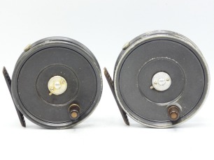 A Hardy Uniqua 3 3/8" trout fly reel, ebonite handle, ribbed brass foot, two screw spring drum latch, milled rim tension screw and Mk.II check mechanism, only light wear to enamel finish, in brown card box and a similar Hardy Uniqua 3 5/8" trout fly reel,