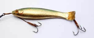A rare Bell's Life gutta percha 4 &frac12;" gudgeon bait, naturalistically painted body with curved metal tail, twin amber/black spot glass eyes and central spindle with one rear and one gimp mounted treble hook, barrel head swivel with gimp trace, also sold as 