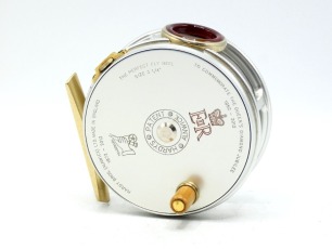 A fine Hardy Perfect 3 &frac14;" Queen's Diamond Jubilee 1952-2012 trout fly reel, limited edition of 250 reels this is a rare un-numbered factory retained model with ivorine handle, brass foot, red agate line guide (no cracks), strapped rim tension screw and 1