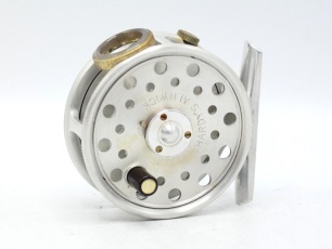 A Hardy St George Junior "spitfire" alloy trout fly reel, left hand wind prototype, un-numbered re-issue model with ebonite handle, three screw spring drum latch, alloy foot, white agate line guide (no cracks), milled rim tension screw and Mk.II check mec