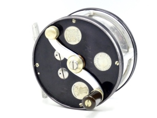 A very rare Hardy Cascapedia 3/0 multiplying salmon fly reel and block leather "D" case, black anodised Duralumin right hand wind model with 2.5:1 ratio gearing, reverse tapered ebonite handle on counter-balanced serpentine handle set within an anti-foul