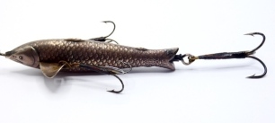 A rare Victorian nickel silver 4" bait, the hollow fish shaped lure with incised scale and fin decoration, twin head spinning vanes, un-named but flank stamped diamond registration mark for 1864, vanes with twin gimp mounted flying treble hooks and centra