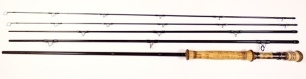 A scarce C.F. Burkheimer "Vintage" 4 piece (2 tips) carbon sea-trout/single hand salmon fly rod, 10', #8, black/gold tipped silk wraps, banded cork handle with wooden reel seat and smoked nickel silver screw grip fitting, only very light signs of use, in