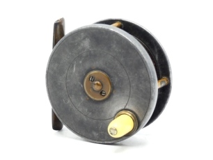A rare Hardy Field 2 7/8" trout fly reel, alloy faceplate with lipped rim, two screw spindle boss and domed ivory handle on milled brass cup, contracted brass drum, waisted brass bridge foot, triple hollow brass drum pillars, faceplate stamped model det