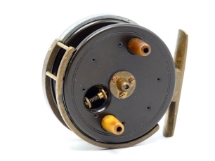 A rare Allcock Britannia 3" centre pin reel, caged ebonite drum with twin tapered horn handles, milled tension adjusting regulator/release latch and raised three screw spindle boss, nickel silver pillared brass B.P. line guide, alloy backplate with brass 