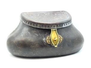 A fine and rare large pot bellied leather creel by T. Atkinson of Wenslydale, the stitched and steamed leather creel of classic bulbous form with sloping lipped lid having twin brass hinges, impressed radiating geometric sunburst pattern within a running 