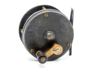 A very rare J.E. Miller, Leeds Reffitt Moore "Rapid" multiplying fly reel, the 25/8" diameter reel with reverse tapered ebonite handle on off-set "S" scroll brass crank winding arm, 2:1 ratio gear retrieve, block foot, triple brass cage pillars, polished