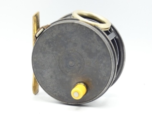 A good Hardy Perfect 3 &frac34;" salmon fly reel, ivorine handle, brass foot, strapped rim tension screw and 1912 check mechanism, slightly dished drum with milled nickel silver locking screw, faceplate stamped central circular logo, reel retains much of the ori