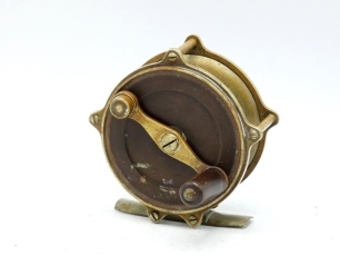 A J. Vom Hofe/H.L. Leonard 3" raised pillar trout fly reel, ebonite and alloy construction with ebonite handle on shaped counter-balanced crank handle, triple raised drum pillars, bridge foot, rear sliding optional check button, faceplate faintly stamped 
