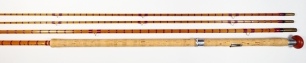 A good Arjon "Salar Extra" 3 piece (2 tips) cane salmon fly rod, 14', crimson silk inter-whipped, sliding alloy reel fitting, reel ring engraved makers detail and leaping salmon motif, suction ferrules, agate lined butt ring, only very light signs of use,