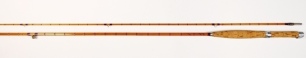 A Hardy "C.C. de France" 2 piece cane trout fly rod, 8', crimson silk inter-whippings, sliding alloy reel fitting, suction ferrule, agate lined butt and tip rings, 1953, light use only, in bag and alloy tube