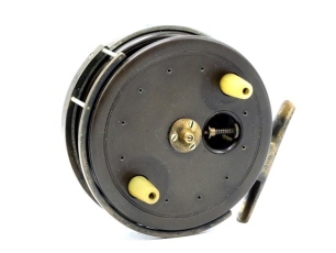 A rare Allcock Britannia 4" centre pin reel, caged ebonite drum with twin tapered horn handles, milled tension adjusting regulator/release latch and raised three screw spindle boss, face stamped "patent", nickel silver pillared brass B.P. line guide, allo