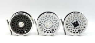 A Hardy Marquis 6 silent check trout fly reel, ebonite handle, two screw drum latch, rear silent drag tension adjuster, new/unused condition, in zip case and card box and two Hardy Marquis 6 trout fly reels of similar design, adjustable click check mecha
