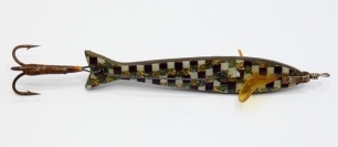 A John Milne patent spangeloid 3 &frac12;" bait, the fish shaped brass and celluloid laminate lure with white/brown chequered and overlaid glitter decoration, twin celluloid spinning vanes and rear treble hook to wire trace, circa 1926