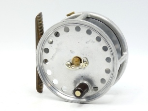 A Hardy The Fly 3 &frac34;" salmon fly reel, "spitfire" finish alloy with ebonite handle, ribbed brass foot, nickel silver telephone drum latch, milled rim tension screw and Mk.II check mechanism, interior stamped "J.S." (Jimmy Smith), only very light signs of u