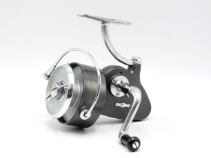 A Hardy Exalta fixed spool reel and three spare spools, folding left hand wind ebonite handle, optional anti-back wind button, full bail arm, as new in cream card box and two Hardy "Wanless" 2 piece cane spinning rods, both 7', 9/10lbs and 4lbs casting w
