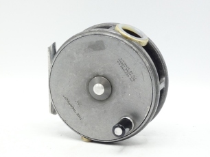 A Hardy Perfect 3 5/8" trout fly reel, ebonite handle, alloy foot, white agate line guide (no cracks) adjustable dual check mechanism, wear to finish from normal use and a Hardy "C.C. de France" 2 piece cane trout fly rod, 9', cane silk inter-whipped, sl