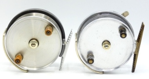 A Hardy Longstone 4" Duralumin sea centre pin reel, twin ebonite handles, nickel silver milled drum tension nut, Bickerdyke line guide, ribbed brass foot, rim mounted optional check lever, 1930's and another similar Hardy Longstone, later model with ribbe