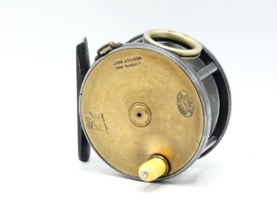 A Hardy Brass Faced Perfect 3 &frac12;" salmon fly reel, domed ivorine handle, pierced alloy foot (small chip to one end), revolving nickel silver line guide, strapped rim tension screw and early calliper spring check mechanism, slightly dished drum with four ri