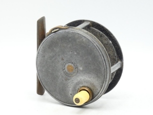 A scarce Hardy Perfect 3 " wide drummed trout fly reel, ivorine handle on milled brass cup, pierced brass foot, strapped rim tension screw and early calliper spring check mechanism, slightly dished drum with four rim cusps and milled nickel silver lockin