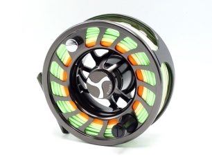 An Orvis Mirage Big Game VI salmon/saltwater fly reel, black nickel anodised finish, skeletal large arbour drum with counter-balanced composition handle and milled locking nut, block foot, ventilated triform backplate with spindle mounted milled tension 