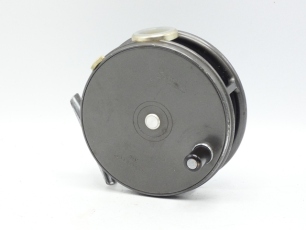 A good Hardy Perfect 3 7/8" trout fly reel, ebonite handle, alloy foot, white agate line guide (no cracks), milled rim tension screw and Mk.II check mechanism, only light wear to enamel finish from normal use, circa 1960