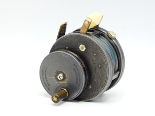 A rare Hardy Silex Multiplier 2 &frac34;" bait casting reel, ebonite handle on off-set circular drive plate, ribbed brass foot, ivorine rim mounted casting bar, milled tension screw and rear ivorine quadrant weight indicator, drive plate stamped make and model 