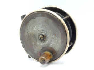 A Hardy brass and ebonite 4" salmon fly reel, domed cow horn handle, bridge foot, twin German silver rims, quadruple cage pillars, fixed check mechanism, faceplate with raised domed brass spindle locking nut and stamped Rod in Hand trademark and enclosed