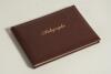 Test and County cricketers. Brown autograph book, signed probably in the 1980&rsquo;s, containing ninety four signatures of past and present cricketers, each to a page, some but not all signed back to back. Signatures include Tyson, F.R. Brown, Cowdrey, Bedser,