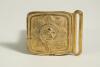 &lsquo;Knight of the Bat&rsquo;. Brass cricket belt buckle of almost square form with head and shoulders image of a batsmen to centre with the legend in circle around it within a octagram shape star, beaded border. Approximately 2.5&rdquo;x2&rdquo;. Good condition