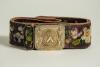 &lsquo;Let Cricket Flourish&rsquo;. Early and complete embroidered belt with square shaped brass belt buckle showing to centre a cricket scoring tent with stumps and crossed bats and ball, two cricketers to left and right, one holding a bat and one holding a ball wit