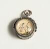 Cricketers&rsquo; compass. Small ornate Victorian silver hallmarked circular compass with compass to face and to verso image of batsman with stumps and wicket keeper behind. Metal loop suspension. Decorative casing. Unusual. Approximately .75&rdquo; diameter. Minor w - 2