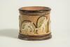 Doulton Lambeth stoneware tobacco jar, hand decorated with six moulded relief vignettes of cricketers to each arched roundel, three in various batting poses, one in wicket-keeping pose and two in fielding pose with an impressed overall flower motif on the - 2