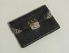 Albert Edward Relf. Sussex, Auckland & England 1900-1921. Black leather wallet with button silver clasp and decorative corners. The initials &lsquo;A.E.R.&rsquo; to front. The wallet has a card with the following handwritten inscription &lsquo;Ex Relf Family. Presented at 