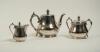 Maurice William Tate. Sussex & England 1912-1937. E.P.B.M. silver plated tea set, comprising of a teapot, sugar bowl and milk jug. Engraved to the teapot is the following inscription &lsquo;Johnnie Walker Trophy. Presented to M.W. Tate, Adelaide 1925&rsquo;. The suga