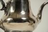 Maurice William Tate. Sussex & England 1912-1937. E.P.B.M. silver plated tea set, comprising of a teapot, sugar bowl and milk jug. Engraved to the teapot is the following inscription &lsquo;Johnnie Walker Trophy. Presented to M.W. Tate, Adelaide 1925&rsquo;. The suga - 2