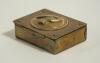 Brass cricket themed box. An attractive brass box with circular image of an early batsman wearing cap and holding his bat to lid. The interior of the box is compartmentalised. The box measures 3&rdquo;x2.5&rdquo;. Good condition - 2