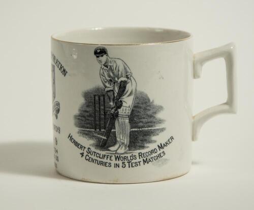 Herbert Sutcliffe, Yorkshire & England 1919-1945. W. Ellis Moorcroft of Bramley commemorative transfer printed mug for &lsquo;Herbert Sutcliffe World Record Maker, 4 Centuries in 5 Test Matches&rsquo; with vignette of Sutcliffe in batting pose. With Pudsey Corporatio