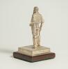 W.G. Grace. Silver figure of W.G. Grace standing wearing cap and in batting pose with bat held to side. The figure mounted to wooden base with title to front &lsquo;W.G. Grace&rsquo;. Hallmarked London 2019 and the silver makers mark NVB for Norman Victor Bassant. Th - 2