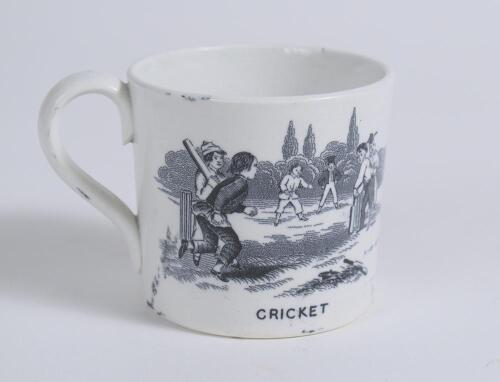 &lsquo;Cricket&rsquo; and &lsquo;Leap Frog&rsquo;. Victorian Staffordshire cricket mug with strap handle, transfer printed in black with images of an early cricket scene with boys playing cricket with title &lsquo;cricket&rsquo; below and to the other side a scene of boys playing Leap Frog 